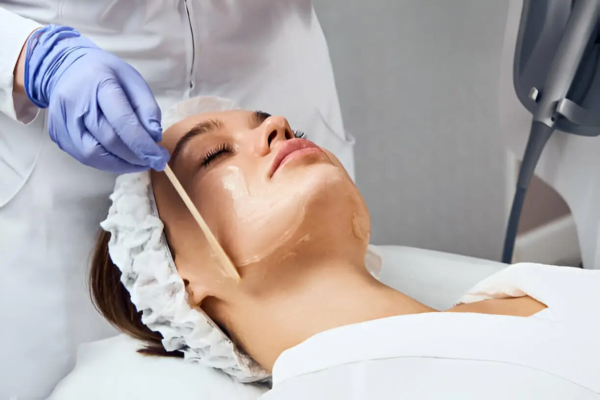 A woman with a clear and rejuvenated complexion, used to guide first-time patients through the power and results of chemical peels.