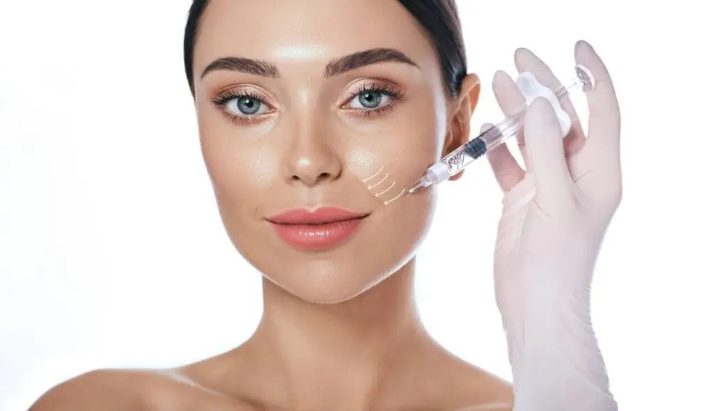 Close-up of a woman with natural-looking facial volume and enhanced features achieved through professional dermal fillers.