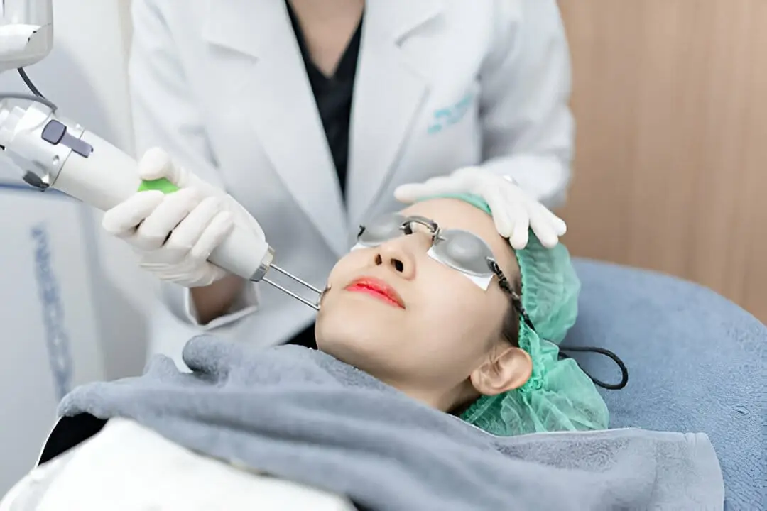 A woman with smooth, even skin texture showcasing how Pico Laser effectively fades stubborn acne scars with minimal downtime.