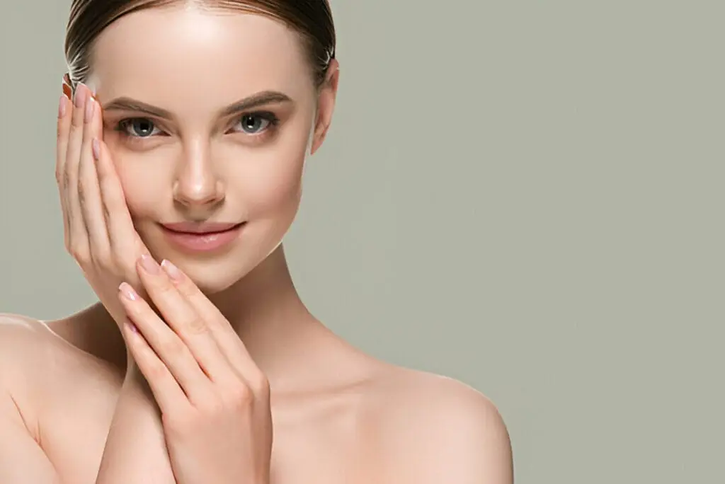 A woman with glowing skin reflecting the ideal results of transitioning your med spa routine to match the changing Georgia weather.