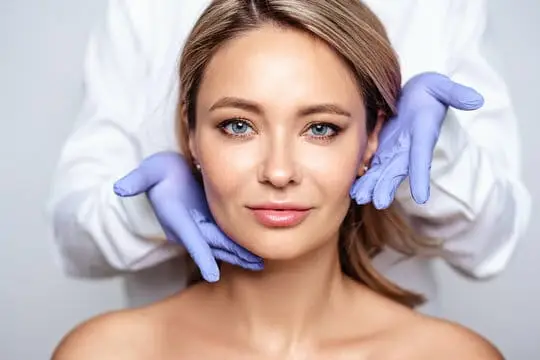 A confident person in professional attire representing the life-changing results of using Botox as a treatment for hyperhidrosis.