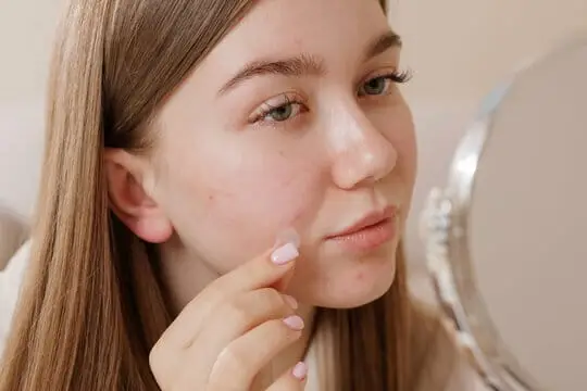 Close-up of clear, even-toned skin highlighting the results of Pico Laser treatment for candidates seeking skin correction in Roswell.